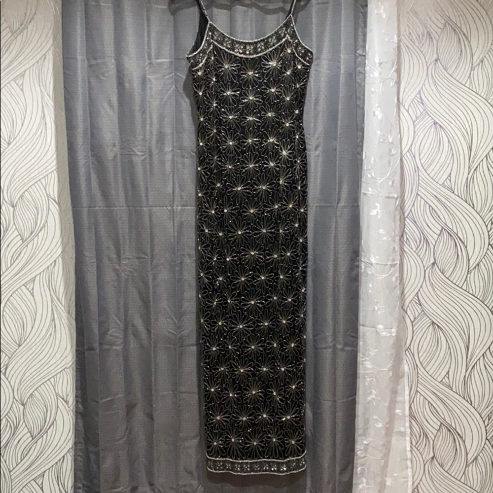 Black full length dress w/silver sequins.  Size 10